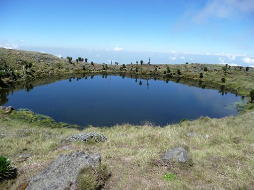 P1050251.JPG - climbing Mt. Muhabura, crater lake on the top